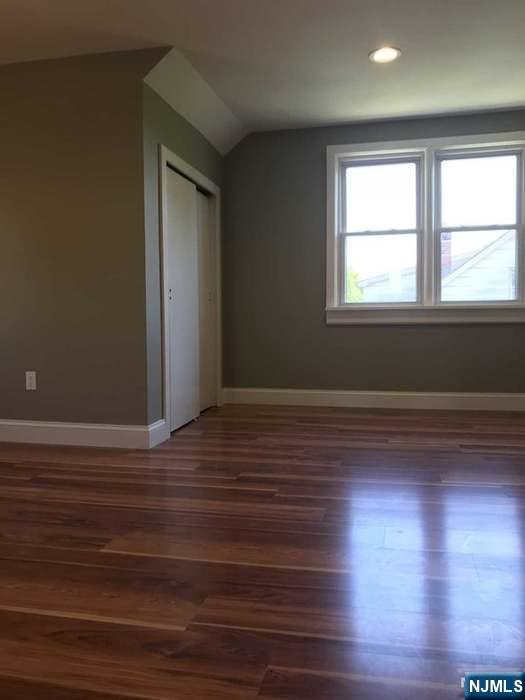 140 Prospect Street, Unit 2 Garfield, NJ 07026 - Photo 12 of 12 a view of room with window and wooden floor