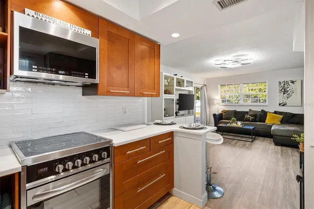 a bedroom with a bed and a table