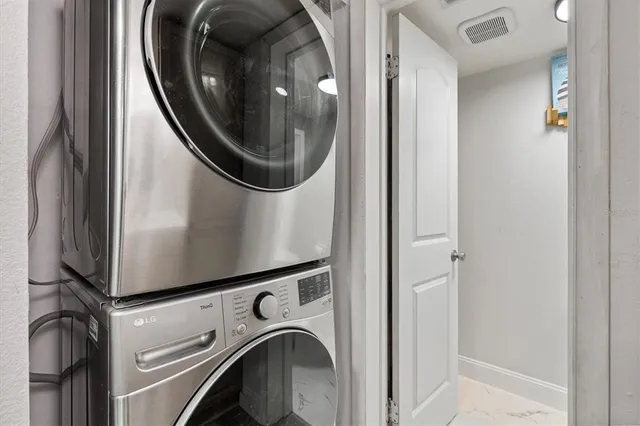 a bedroom with a bed and a desk