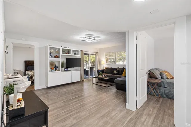 a room with furniture and a wooden floor