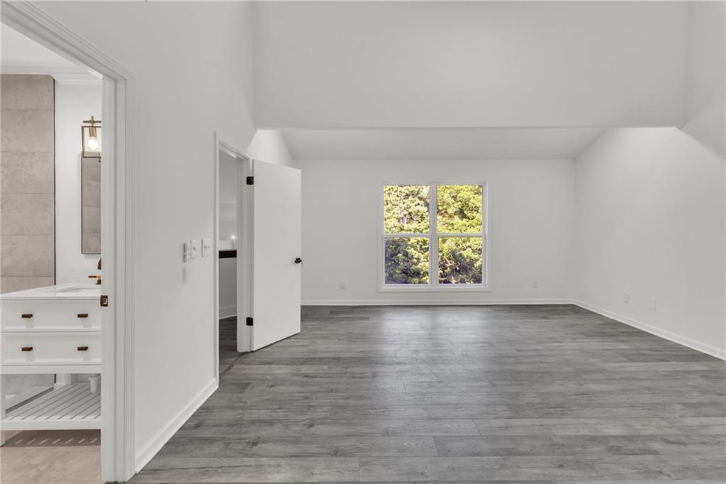 5483 Wylstream Way Norcross, GA 30093 - Photo 30 of 56 wooden floor in an empty room