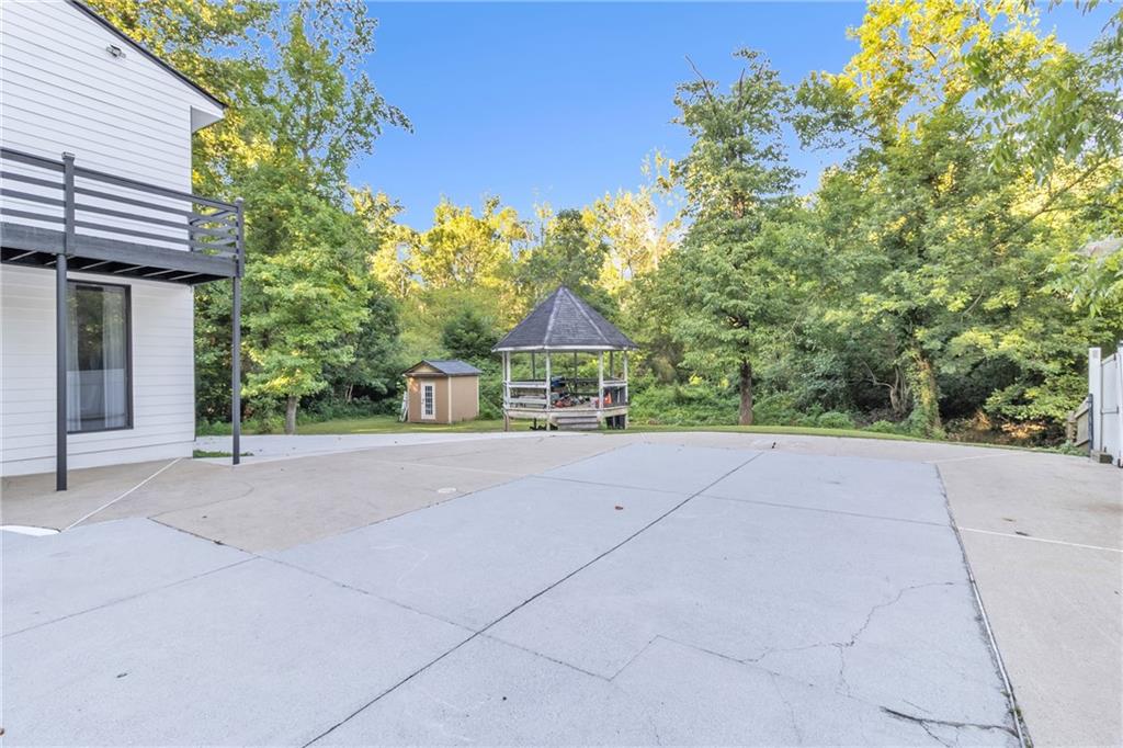5483 Wylstream Way Norcross, GA 30093 - Photo 52 of 56 a house view with a outdoor space