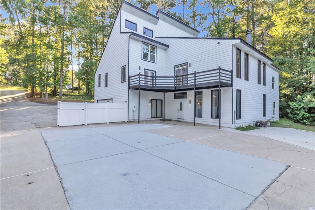 5483 Wylstream Way Norcross, GA 30093 - Photo 53 of 56 front view of a house with a street