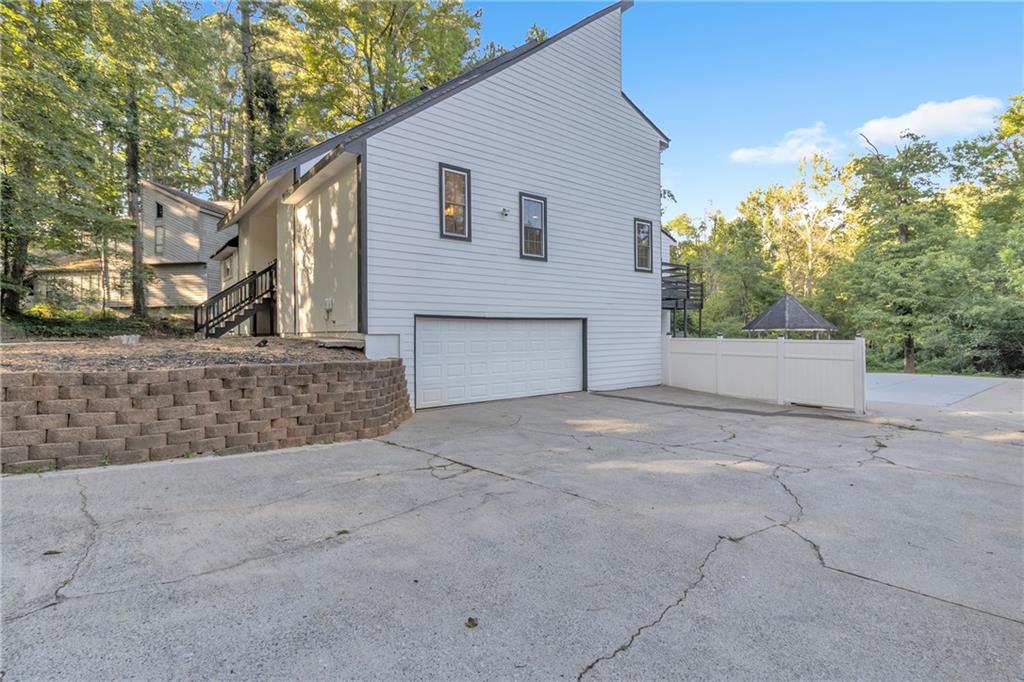 5483 Wylstream Way Norcross, GA 30093 - Photo 56 of 56 a view of back yard of the house