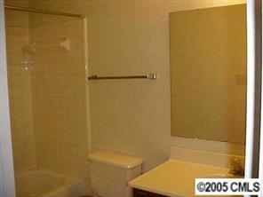 6832 Pence Road Charlotte, NC 28227 - Photo 7 of 8 a bathroom with a bathtub