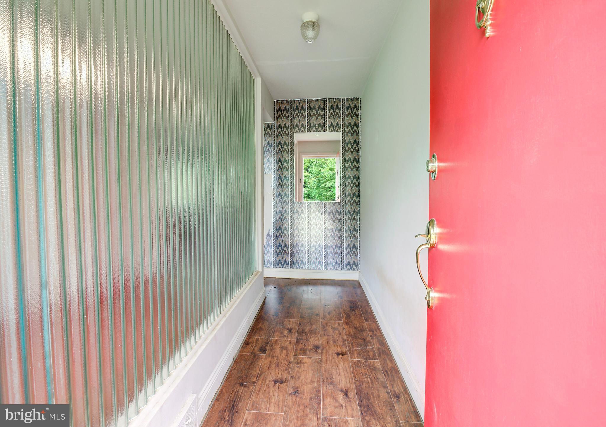 522 Sutherland Road Trenton, NJ 08618 - Photo 7 of 26 Entry Way/Foyer with Original Glass Wall