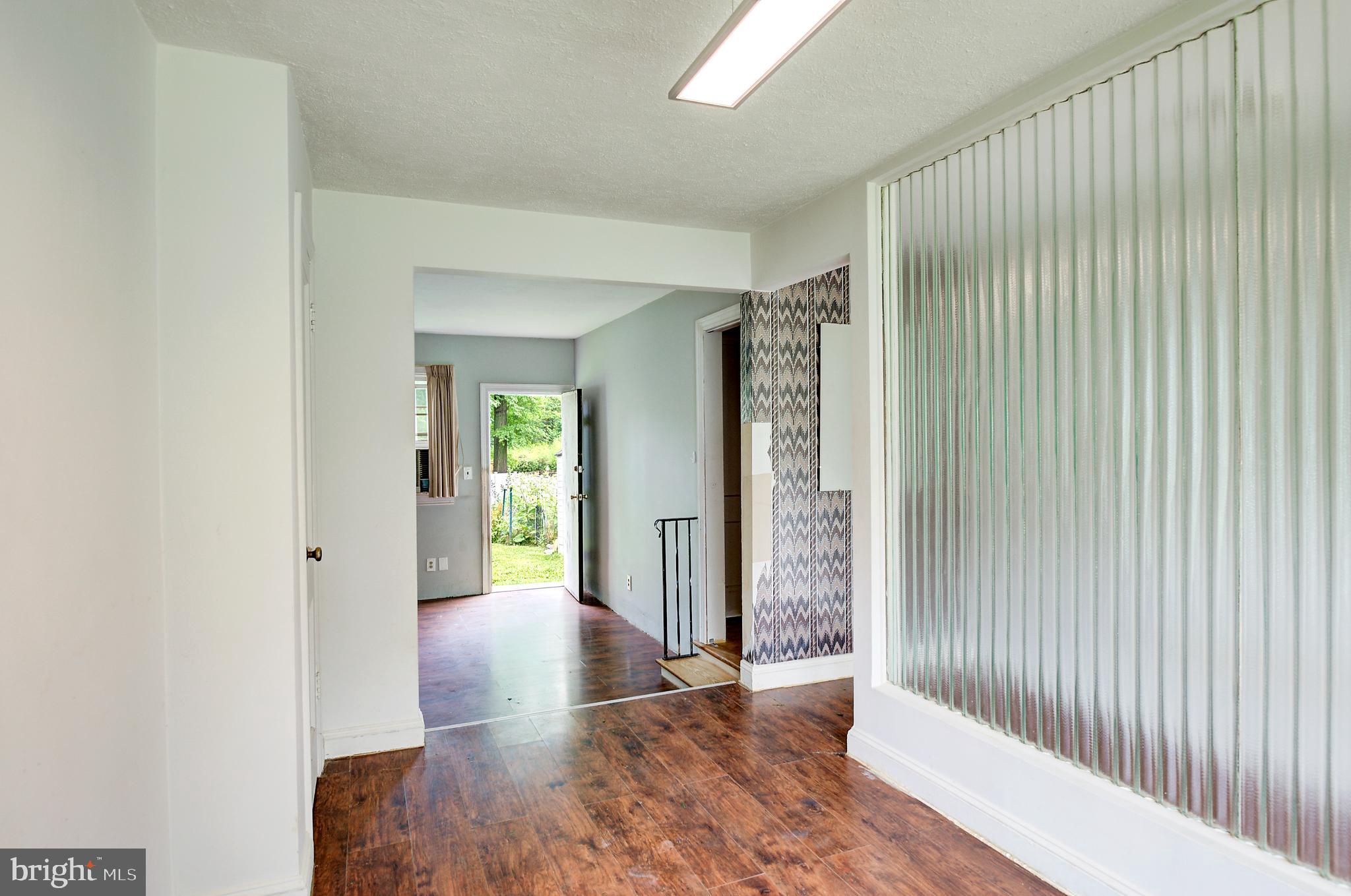 522 Sutherland Road Trenton, NJ 08618 - Photo 9 of 26 Dining Room view through Living Room to Yard