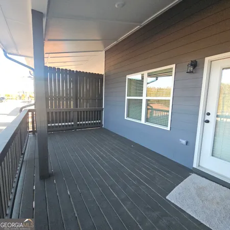 a view of a house with wooden floor