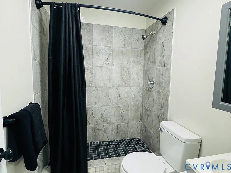 350 Staten Street Norfolk, VA 23503 - Photo 4 of 12 a bathroom with a toilet and a shower