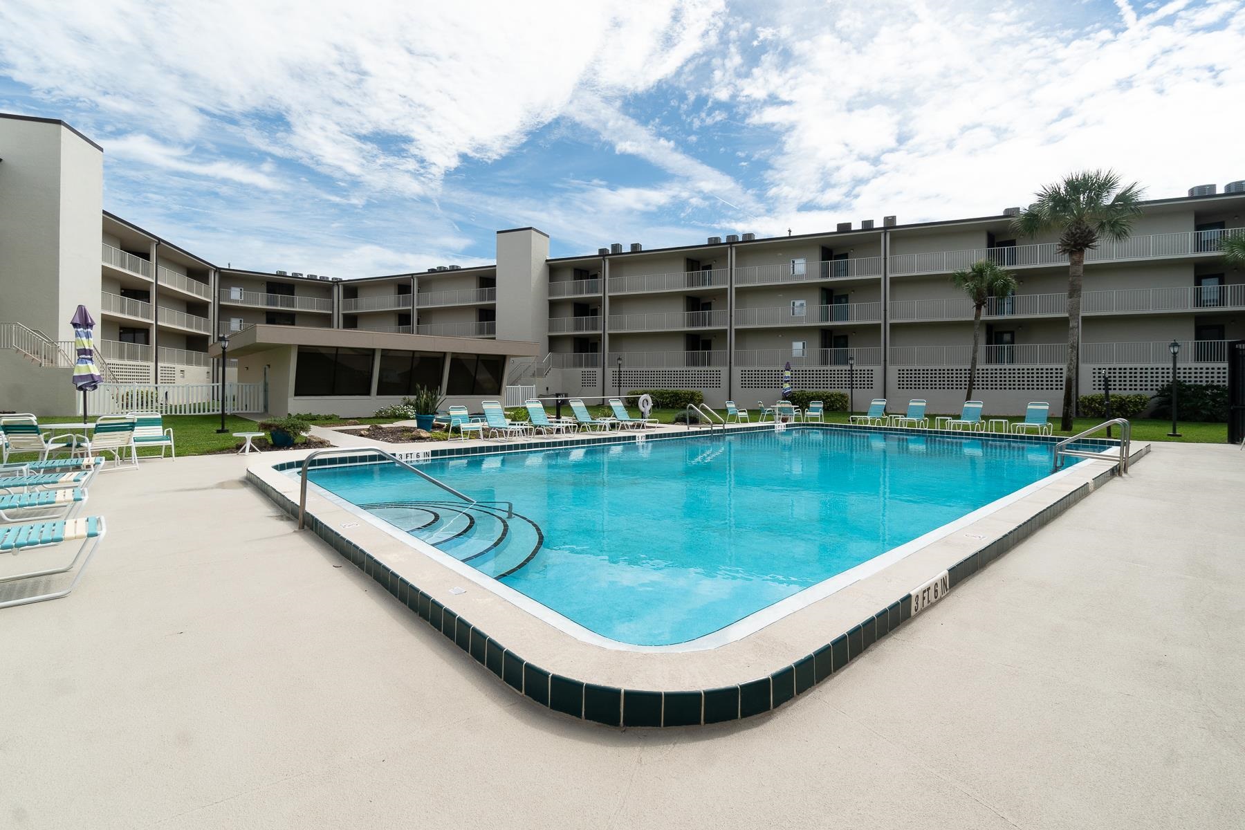 1 Dondanville Road, Unit C 215 St. Augustine, FL 32080 - Photo 29 of 33 a view of a swimming pool with outdoor seating
