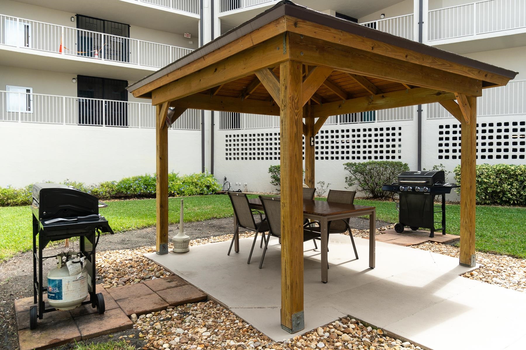 1 Dondanville Road, Unit C 215 St. Augustine, FL 32080 - Photo 31 of 33 a patio with table and chairs