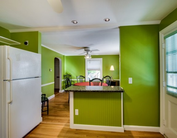 8 Martin Road Wellesley, MA 02481 - Photo 7 of 24 a kitchen with a refrigerator and a sink