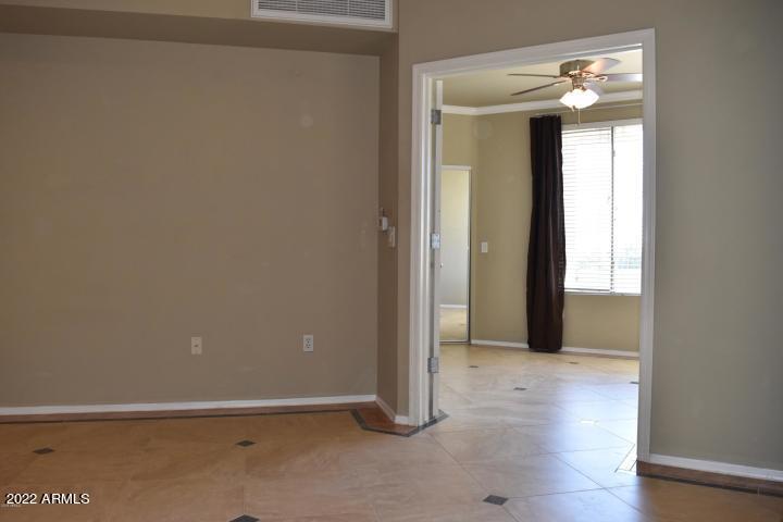 1701 East Colter Street, Unit 459 Phoenix, AZ 85016 - Photo 11 of 50 a view of an empty room with closet and a window