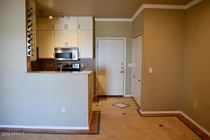 1701 East Colter Street, Unit 459 Phoenix, AZ 85016 - Photo 4 of 50 a view of a storage & utility room with two washing machine