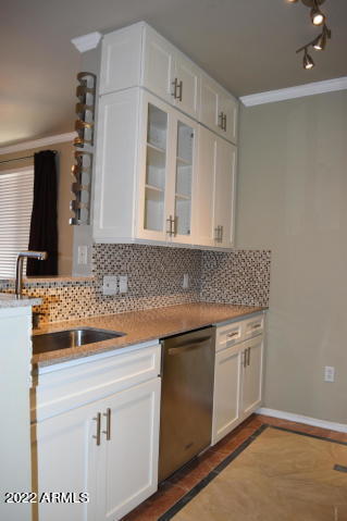 1701 East Colter Street, Unit 459 Phoenix, AZ 85016 - Photo 8 of 50 a kitchen with stainless steel appliances granite countertop a sink and a stove