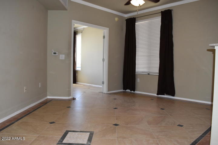 1701 East Colter Street, Unit 459 Phoenix, AZ 85016 - Photo 9 of 50 an empty room with windows