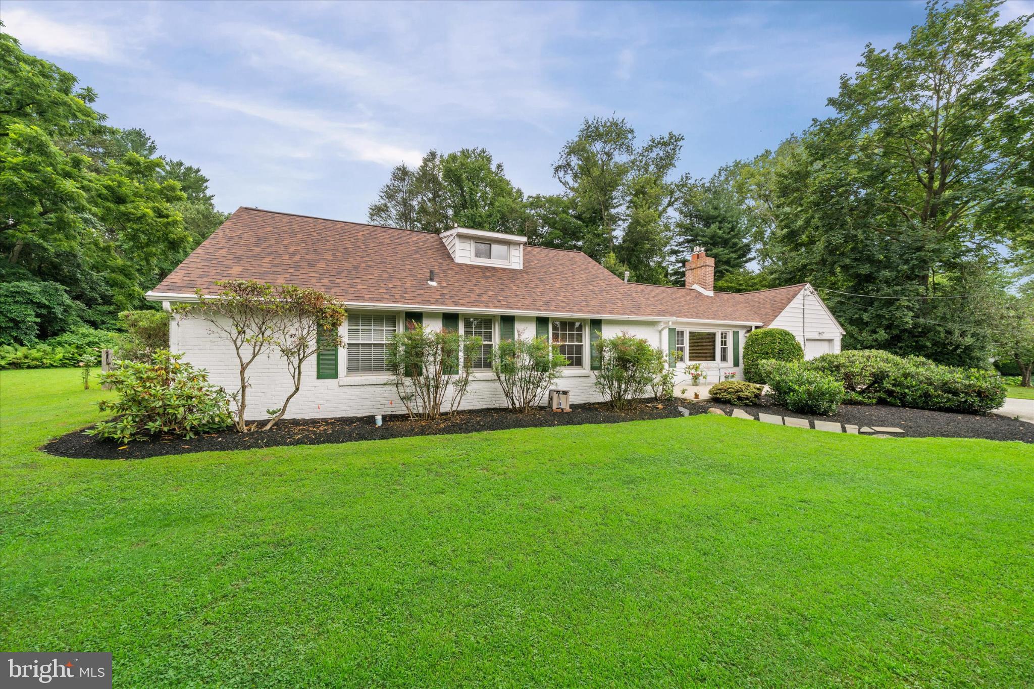 47 Rabbit Run Road Rose Valley, PA 19086 - Photo 3 of 48 Charming home nestled in lush greenery.