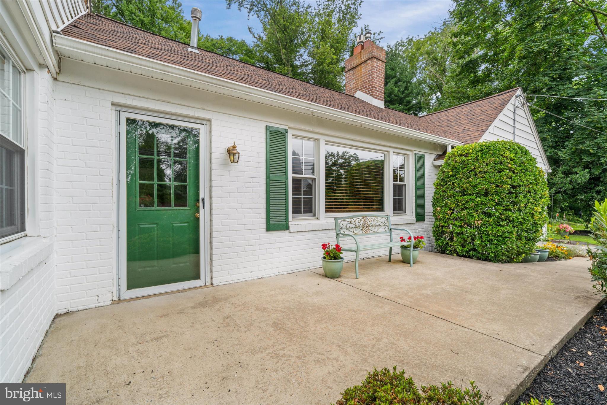 47 Rabbit Run Road Rose Valley, PA 19086 - Photo 4 of 48 Charming home with inviting green accents.