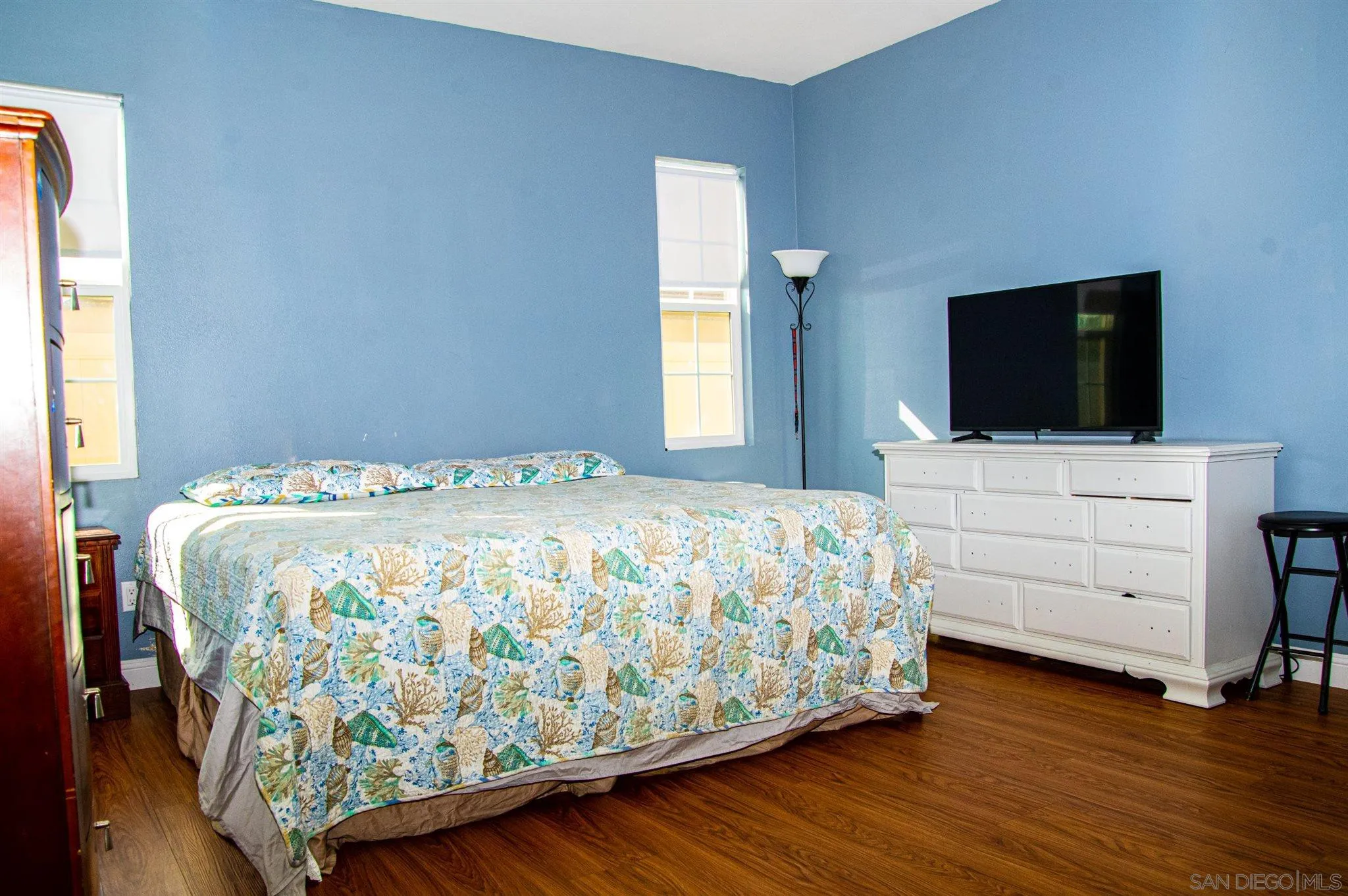 2131 Canvas Way San Jacinto, CA 92582 - Photo 15 of 36 a bedroom with a bed and a flat screen tv