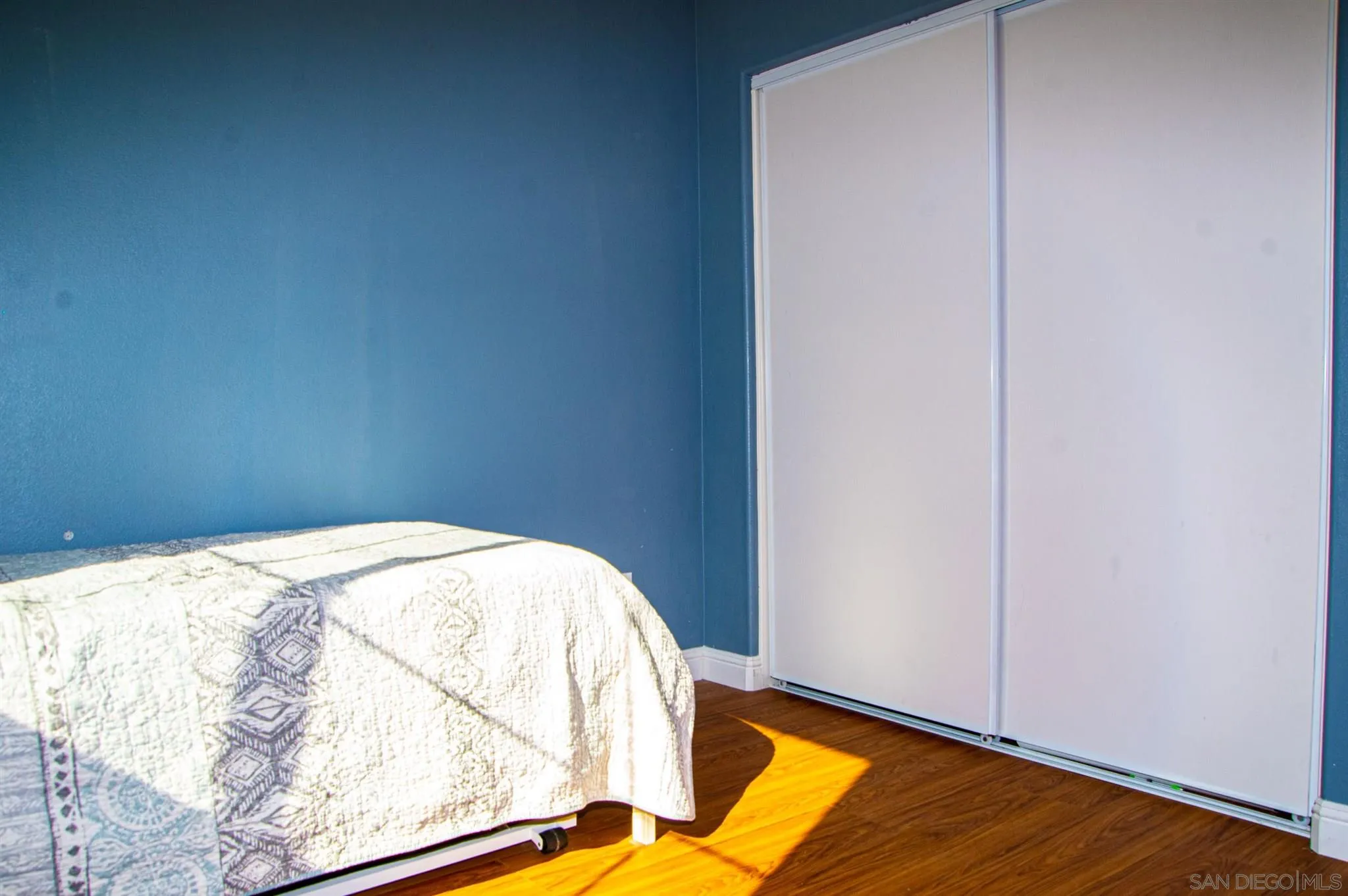 2131 Canvas Way San Jacinto, CA 92582 - Photo 28 of 36 a view of a room with wooden floor