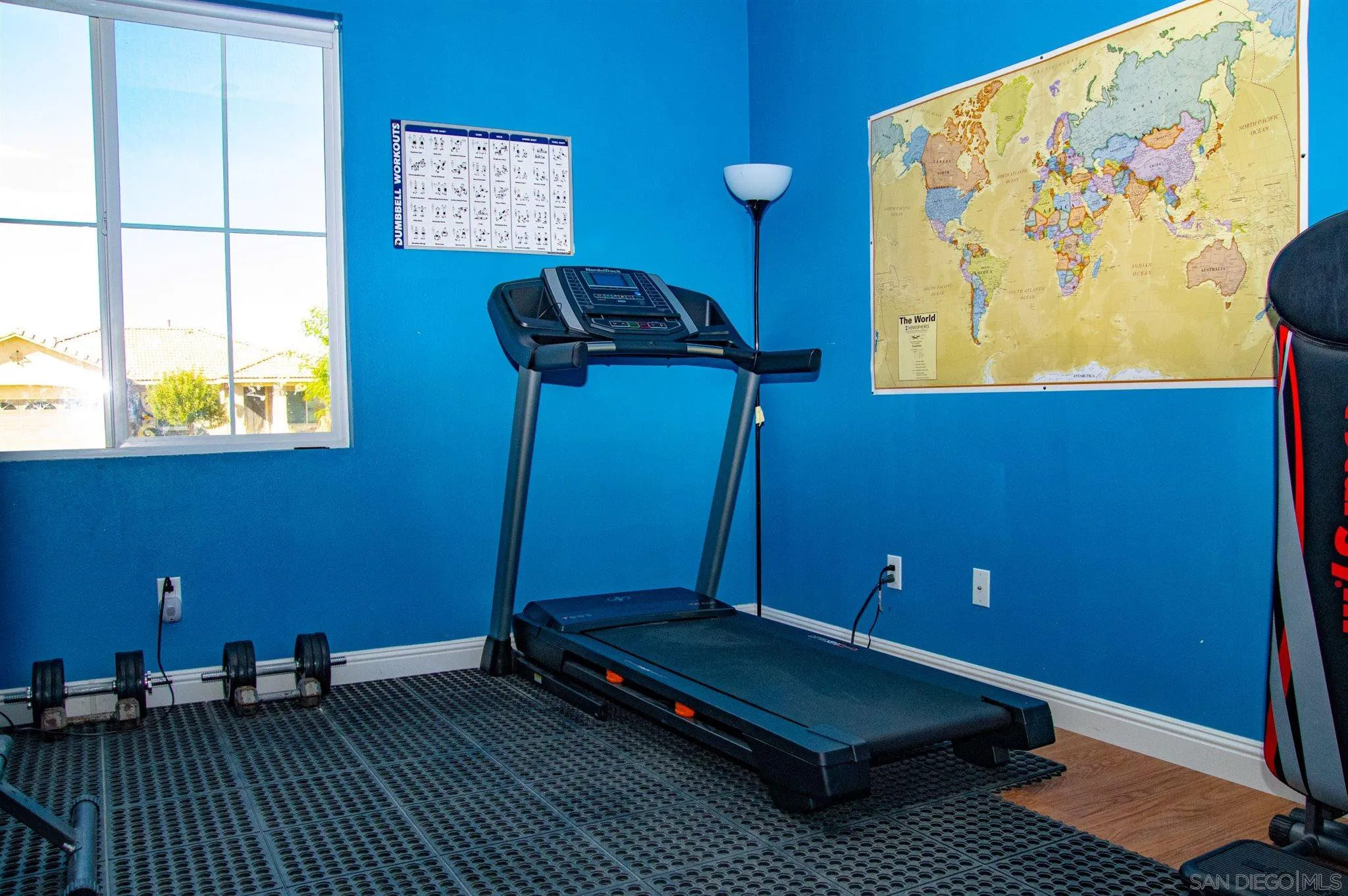 2131 Canvas Way San Jacinto, CA 92582 - Photo 32 of 36 a view of a room with furniture and wooden floor