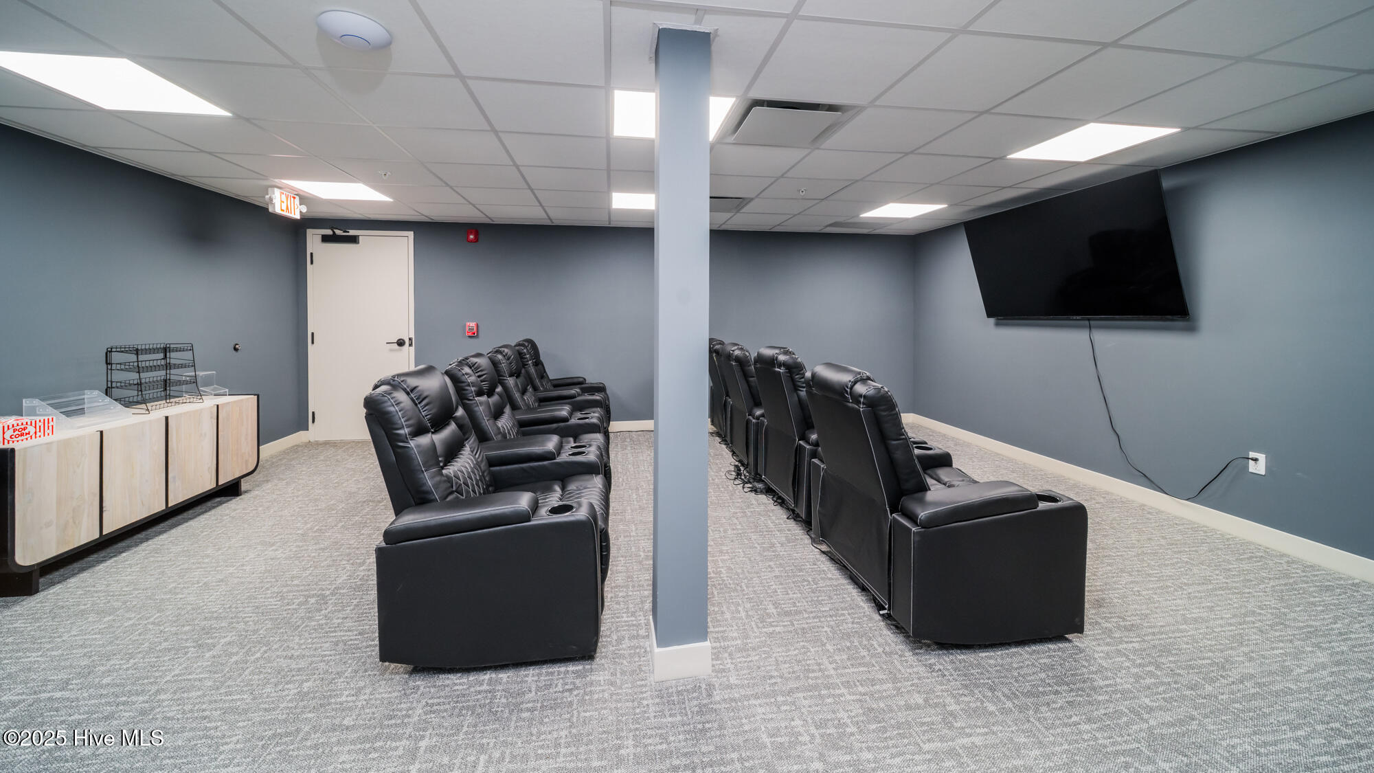 128 C Marcella Lane, Unit 102 Calabash, NC 28467 - Photo 26 of 34 Theater space