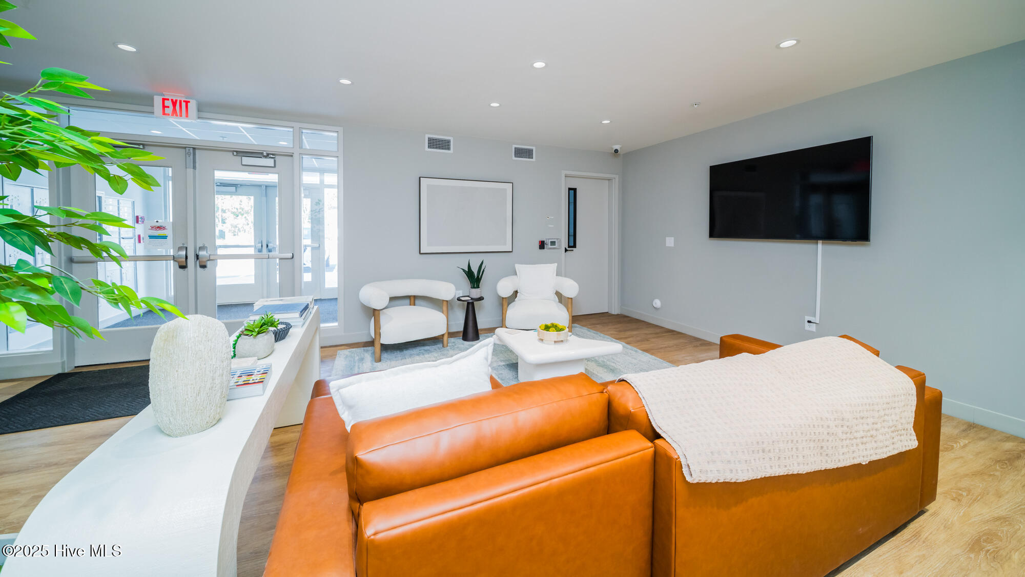 128 C Marcella Lane, Unit 102 Calabash, NC 28467 - Photo 29 of 34 smaller gathering area in the apartment building