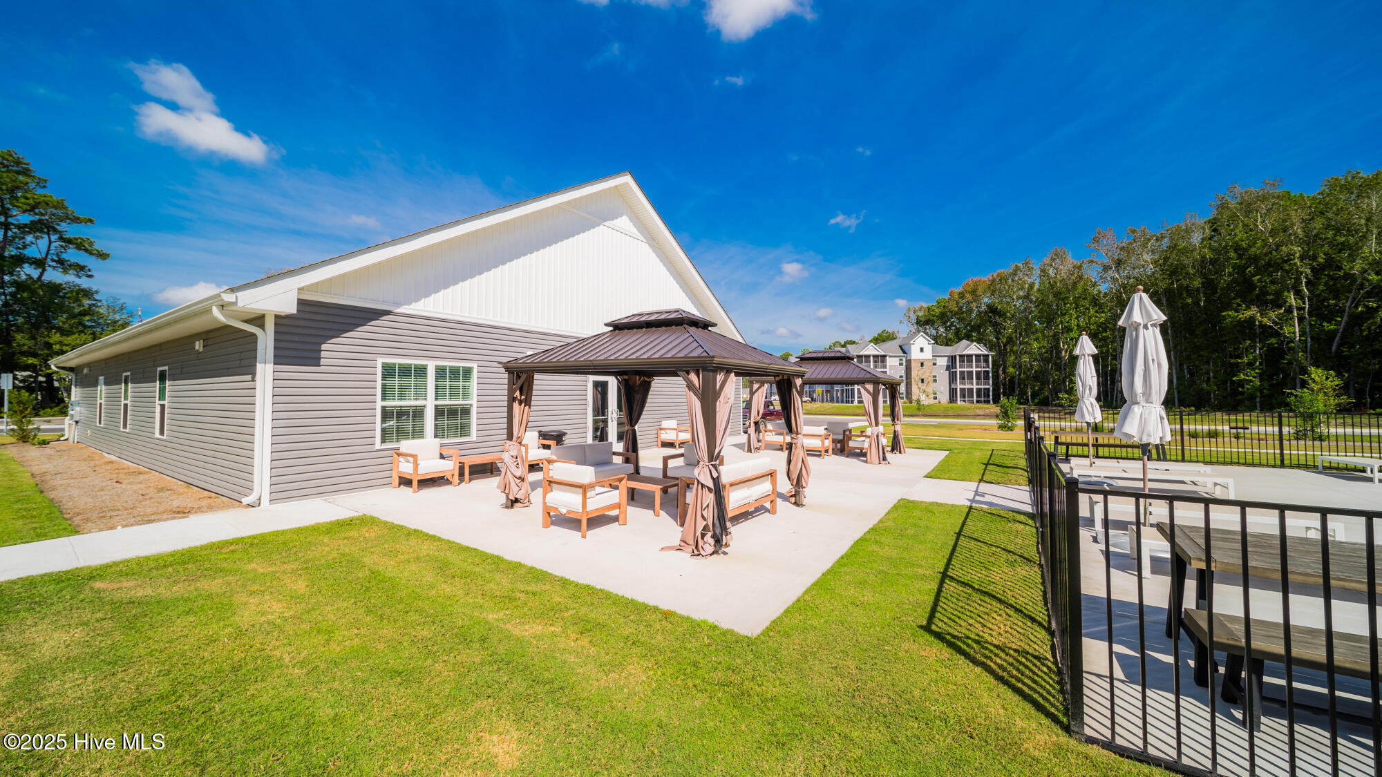 128 C Marcella Lane, Unit 102 Calabash, NC 28467 - Photo 31 of 34 relax under the cabana