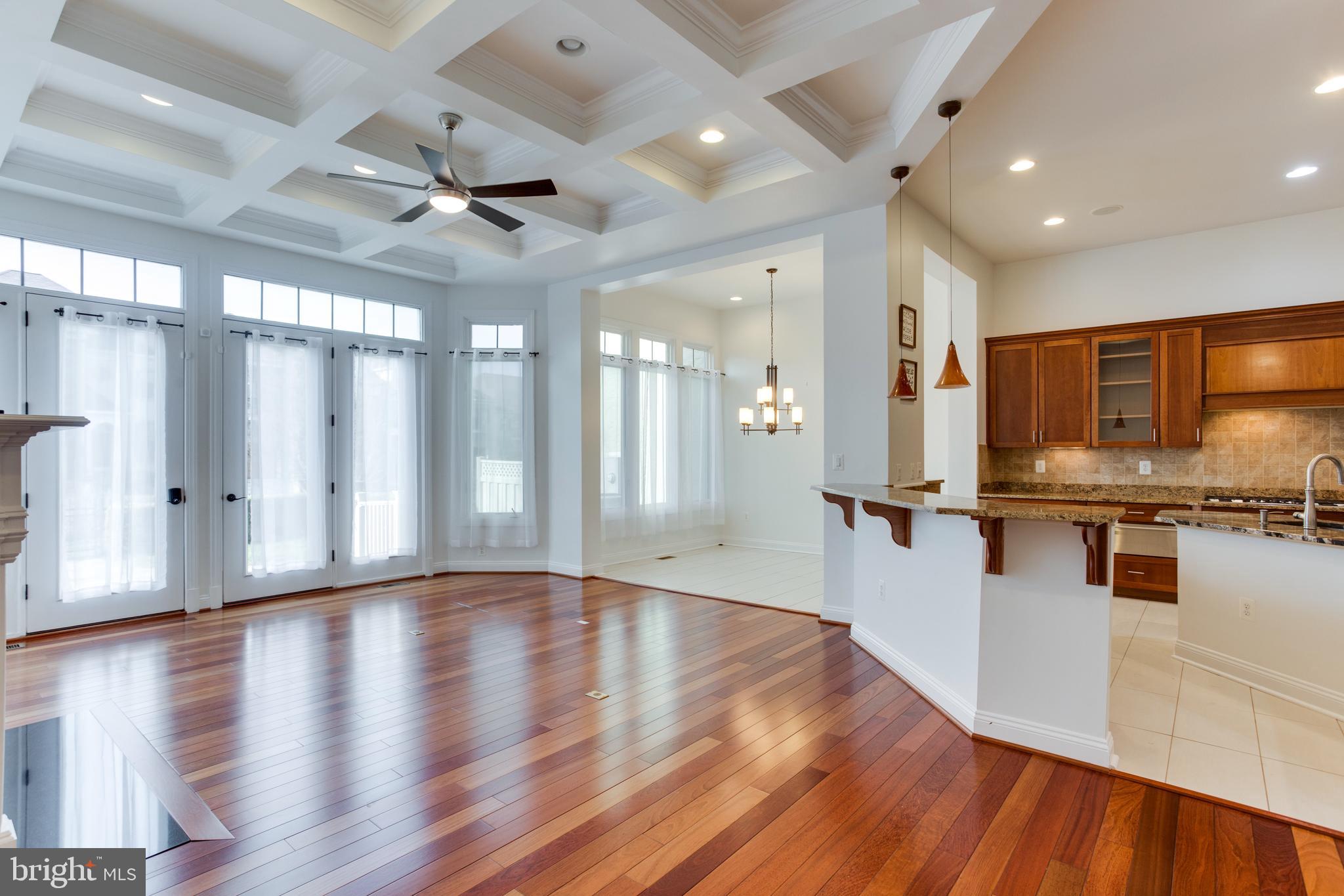 18353 Fairway Oaks Square Leesburg, VA 20176 - Photo 13 of 50 a view of a kitchen with a sink and a stove top oven