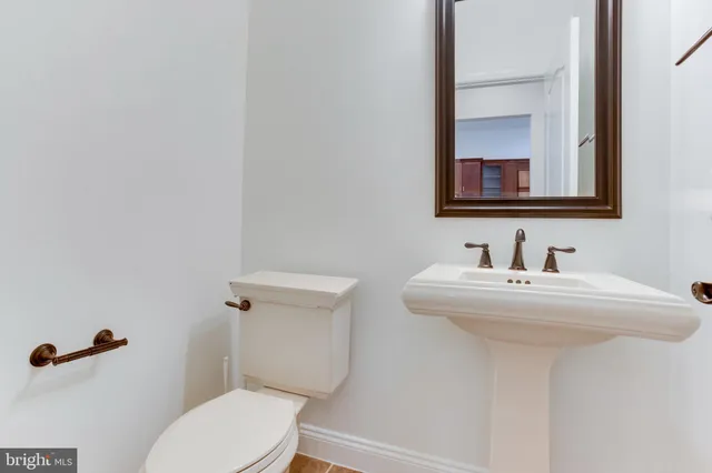 a bathroom with a sink and a toilet
