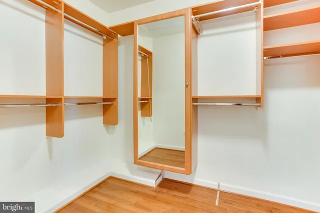 a bathroom with a shower and a glass door