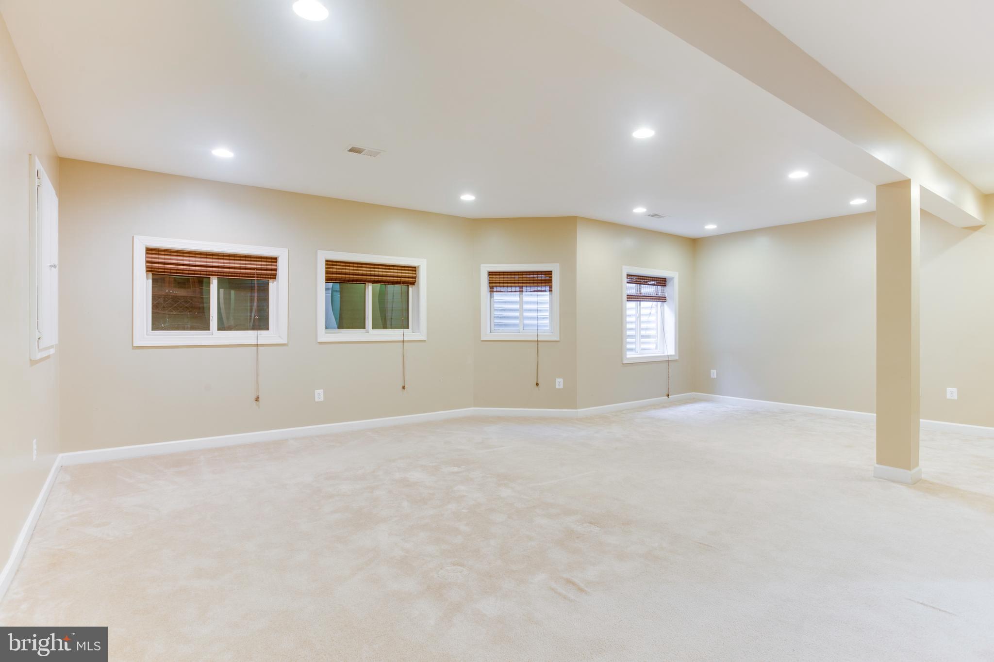 18353 Fairway Oaks Square Leesburg, VA 20176 - Photo 49 of 50 a view of an empty room with windows