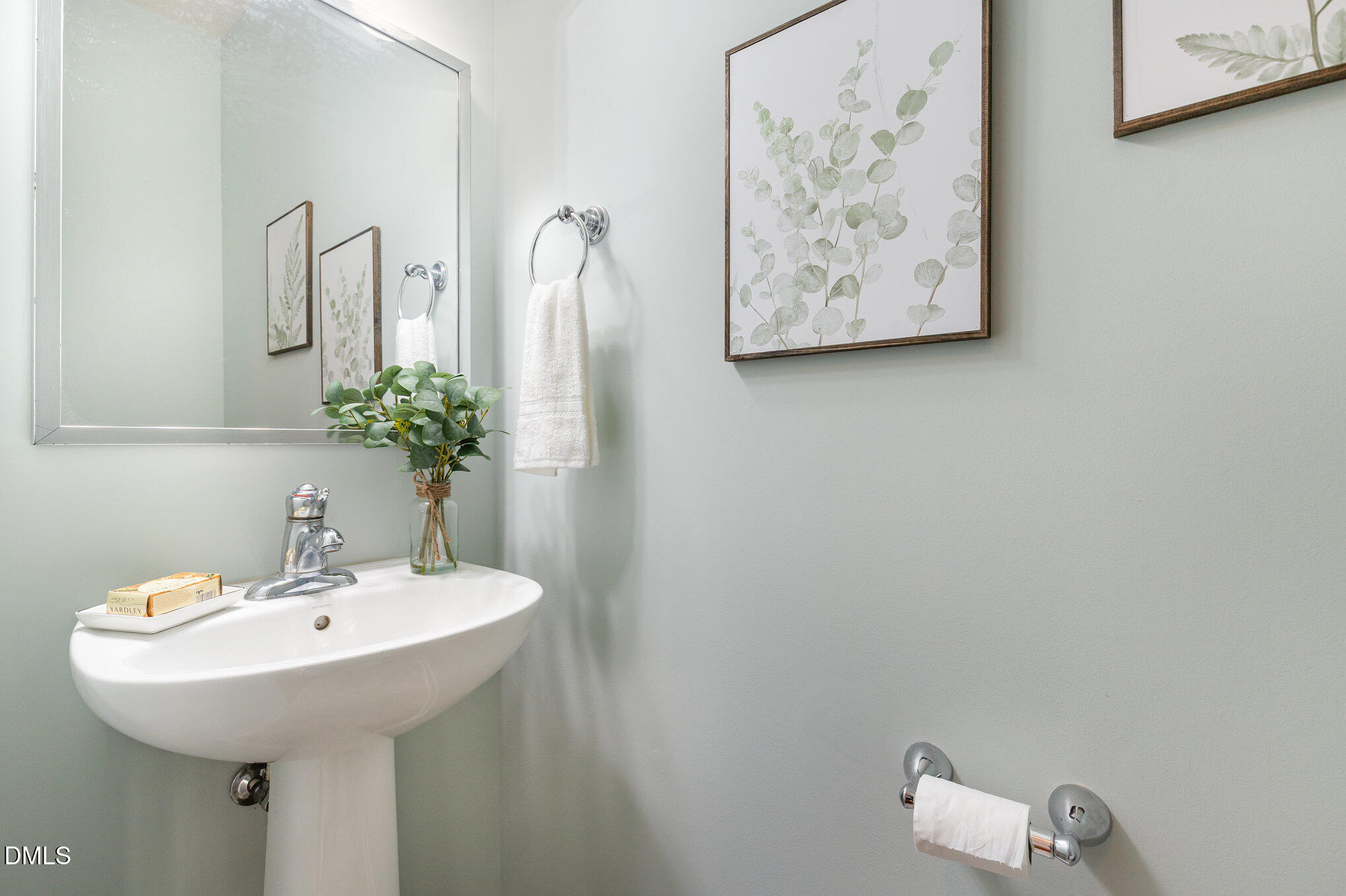 8325 Pilots View Drive Raleigh, NC 27617 - Photo 18 of 28 a bathroom with a sink and a mirror