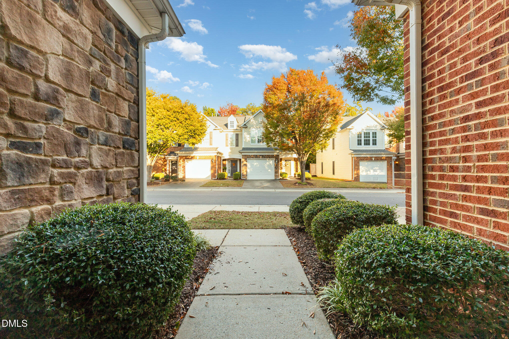8325 Pilots View Drive Raleigh, NC 27617 - Photo 3 of 28 a view of a pathway both side of building