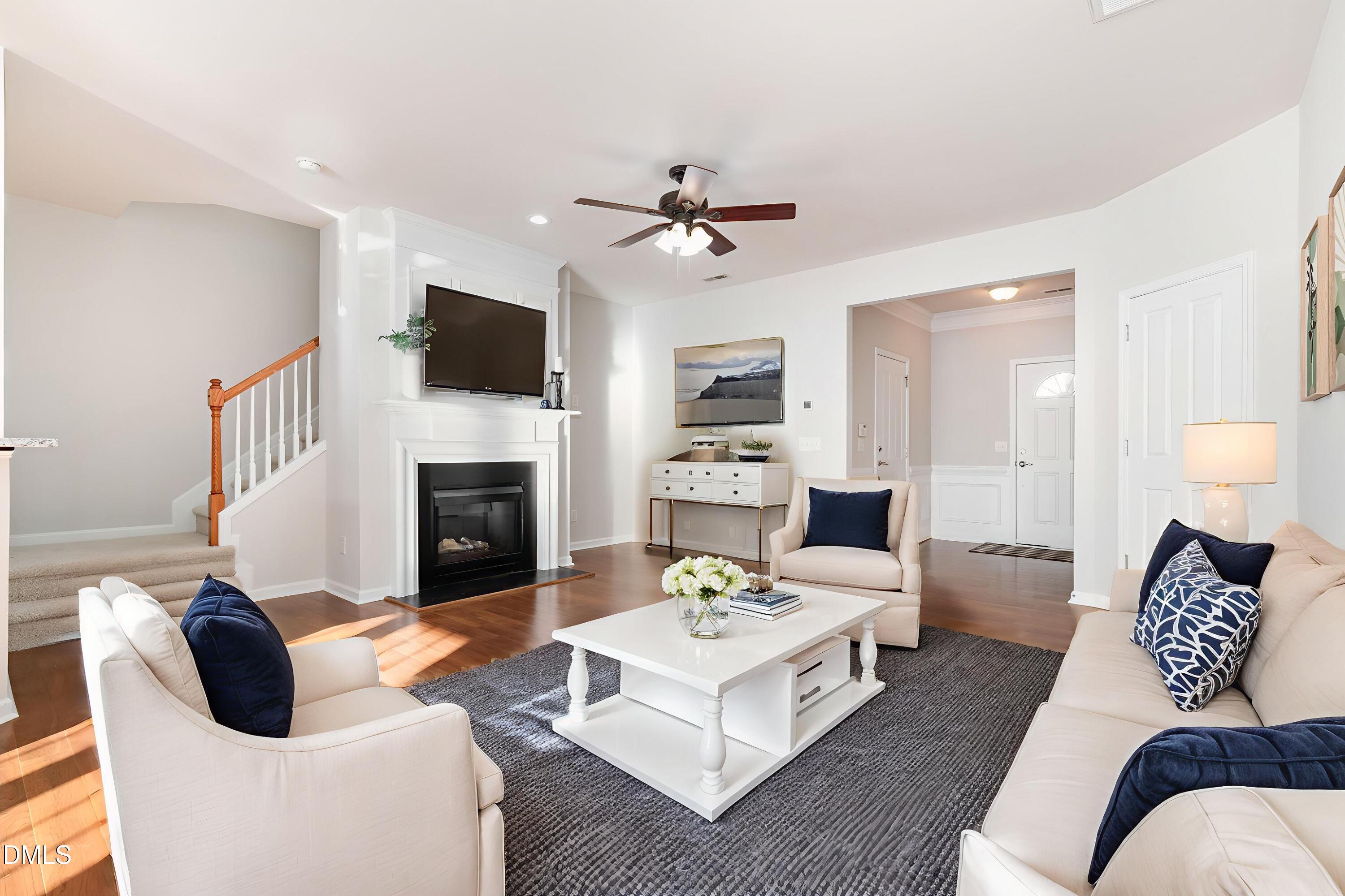 8325 Pilots View Drive Raleigh, NC 27617 - Photo 6 of 28 a living room with furniture fireplace and flat screen tv