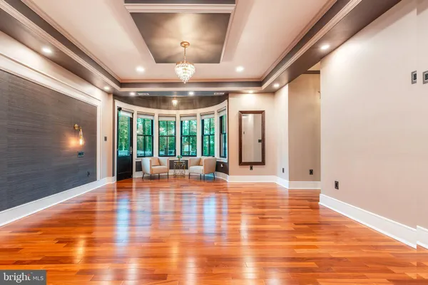 a bathroom with a bathtub and a window
