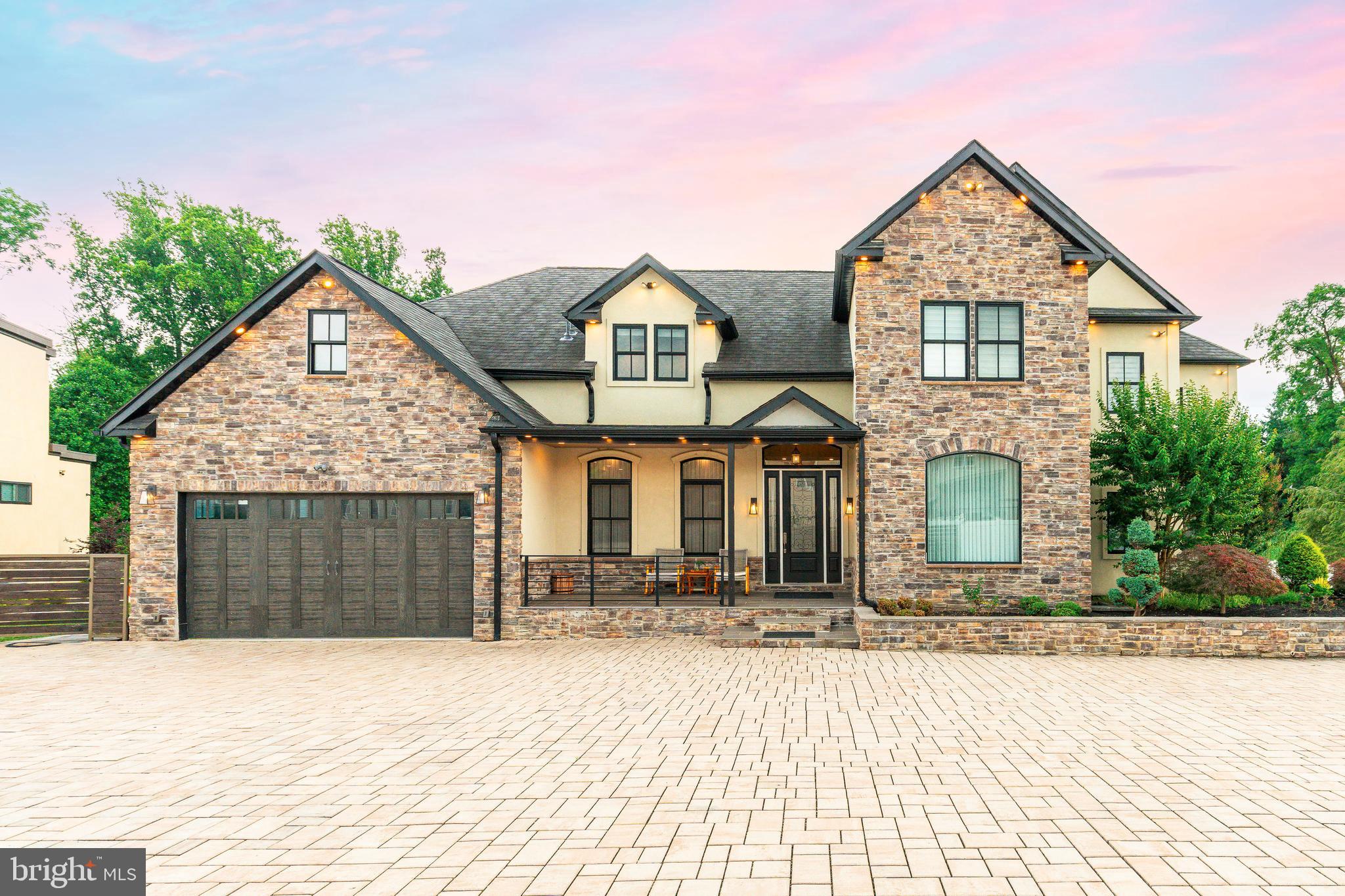 1226 Norwalk Road Philadelphia, PA 19115 - Photo 2 of 68 a front view of a house with a yard