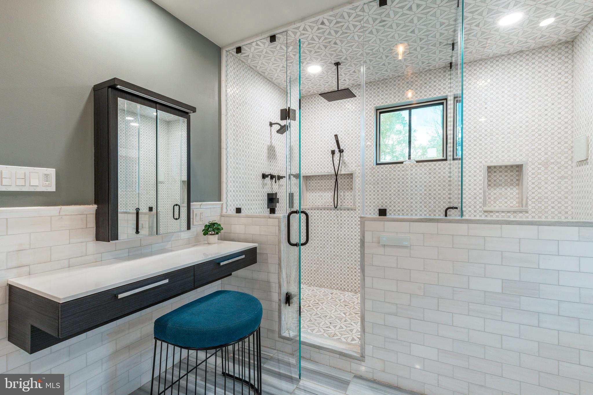 1226 Norwalk Road Philadelphia, PA 19115 - Photo 25 of 68 a bathroom with a tub sink and mirror