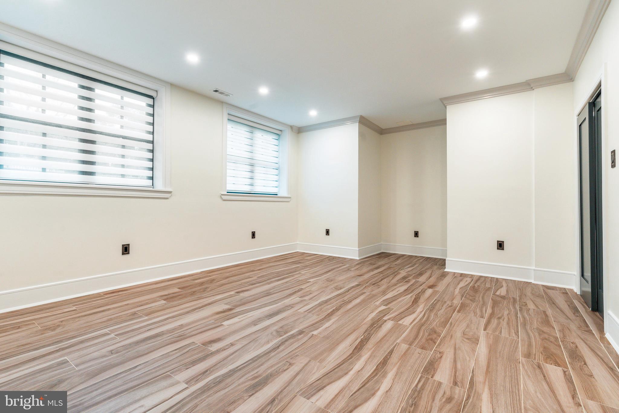 1226 Norwalk Road Philadelphia, PA 19115 - Photo 36 of 68 a view of a room with wooden floor and window