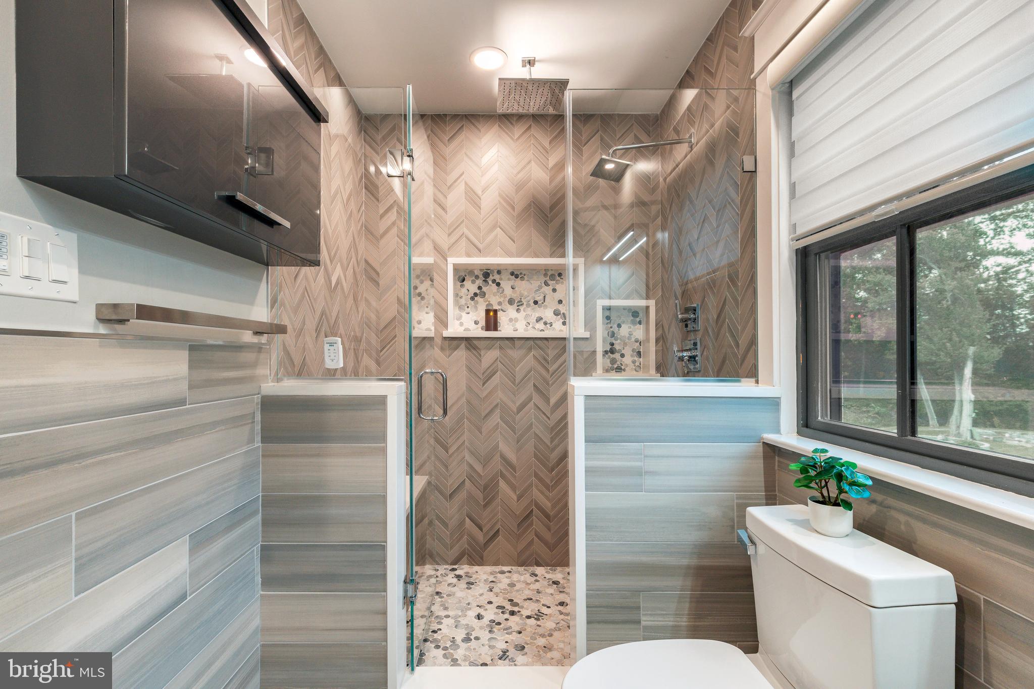 1226 Norwalk Road Philadelphia, PA 19115 - Photo 45 of 68 a bathroom with a toilet sink and shower