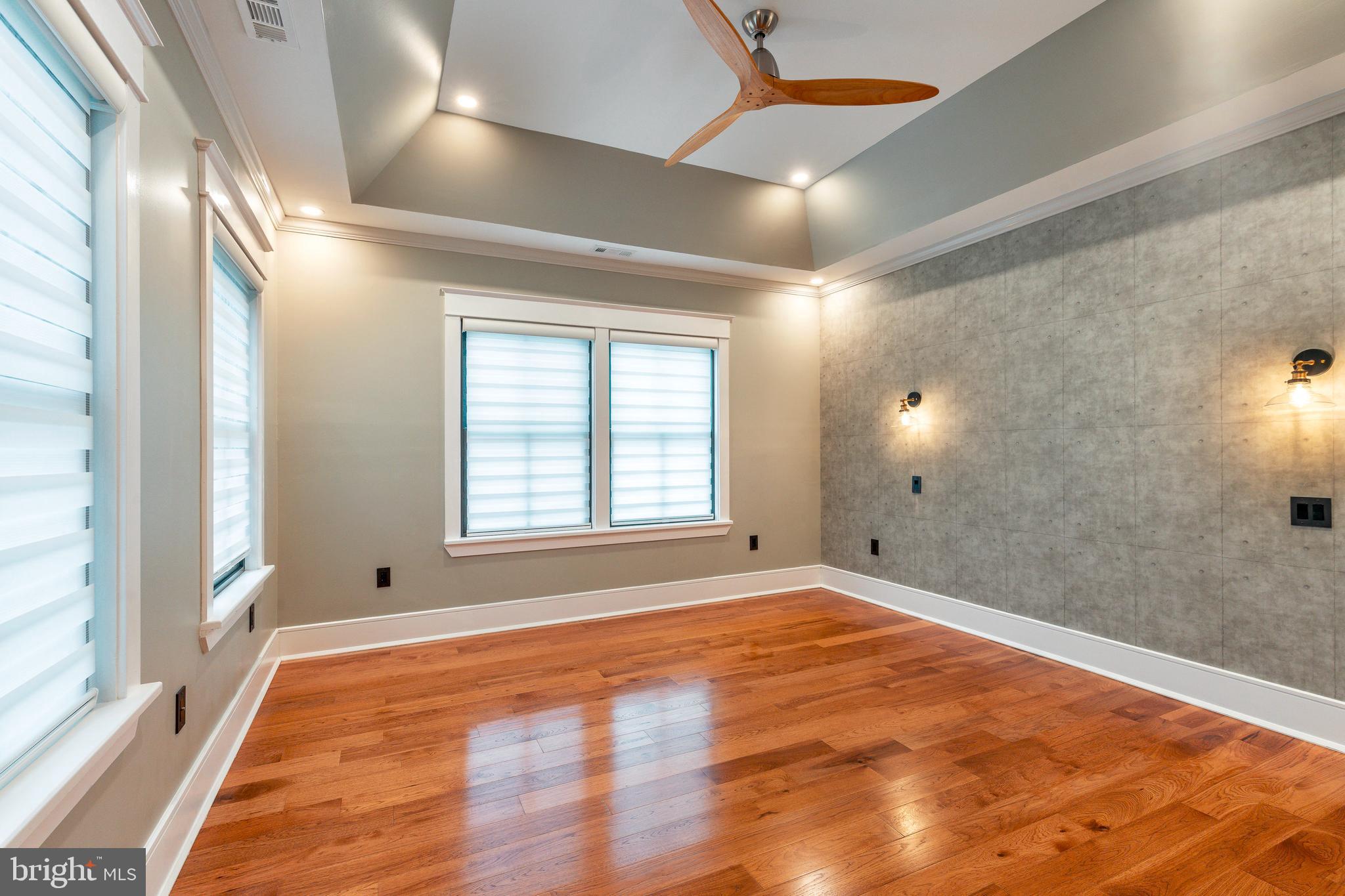 1226 Norwalk Road Philadelphia, PA 19115 - Photo 48 of 68 a view of an empty room with wooden floor and a window