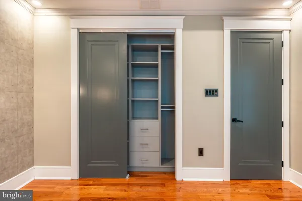 a view of a patio with table and chairs