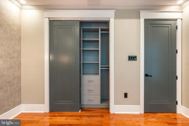 a view of a patio with table and chairs