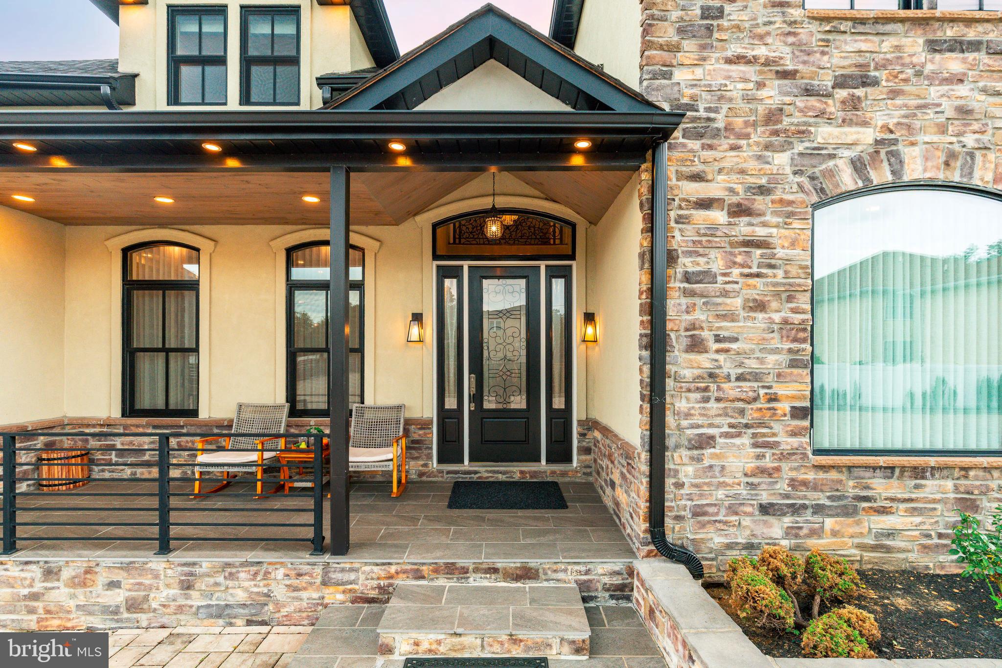 1226 Norwalk Road Philadelphia, PA 19115 - Photo 5 of 68 a front view of a house with glass windows