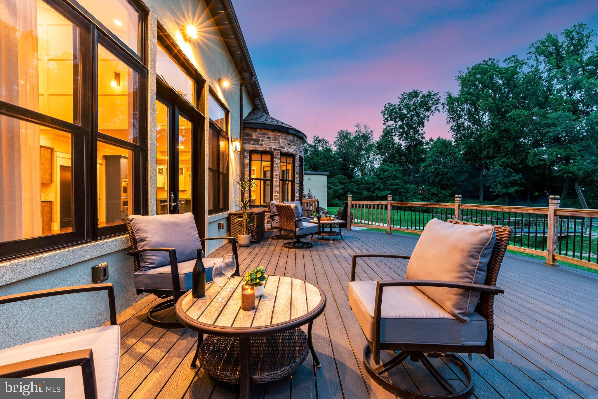 1226 Norwalk Road Philadelphia, PA 19115 - Photo 64 of 68 a view of a patio with couches table and chairs and wooden floor