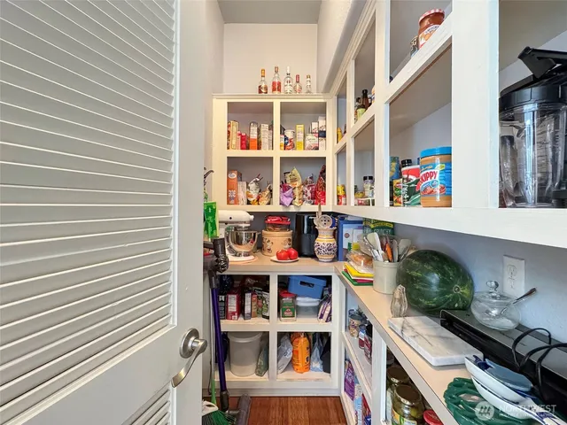 a view of swimming pool with lounge chair