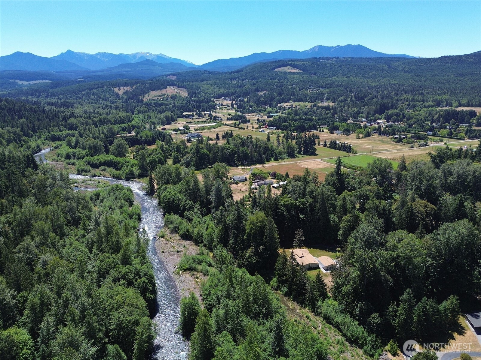 77 Rd Less Traveled Way Sequim, WA 98382 - Photo 2 of 40 an aerial view of residential house and sandy dunes