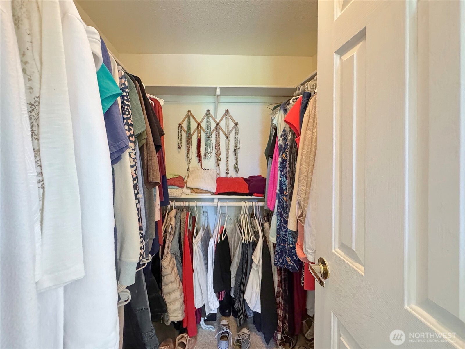 77 Rd Less Traveled Way Sequim, WA 98382 - Photo 27 of 40 a view of walk in closet with clothes