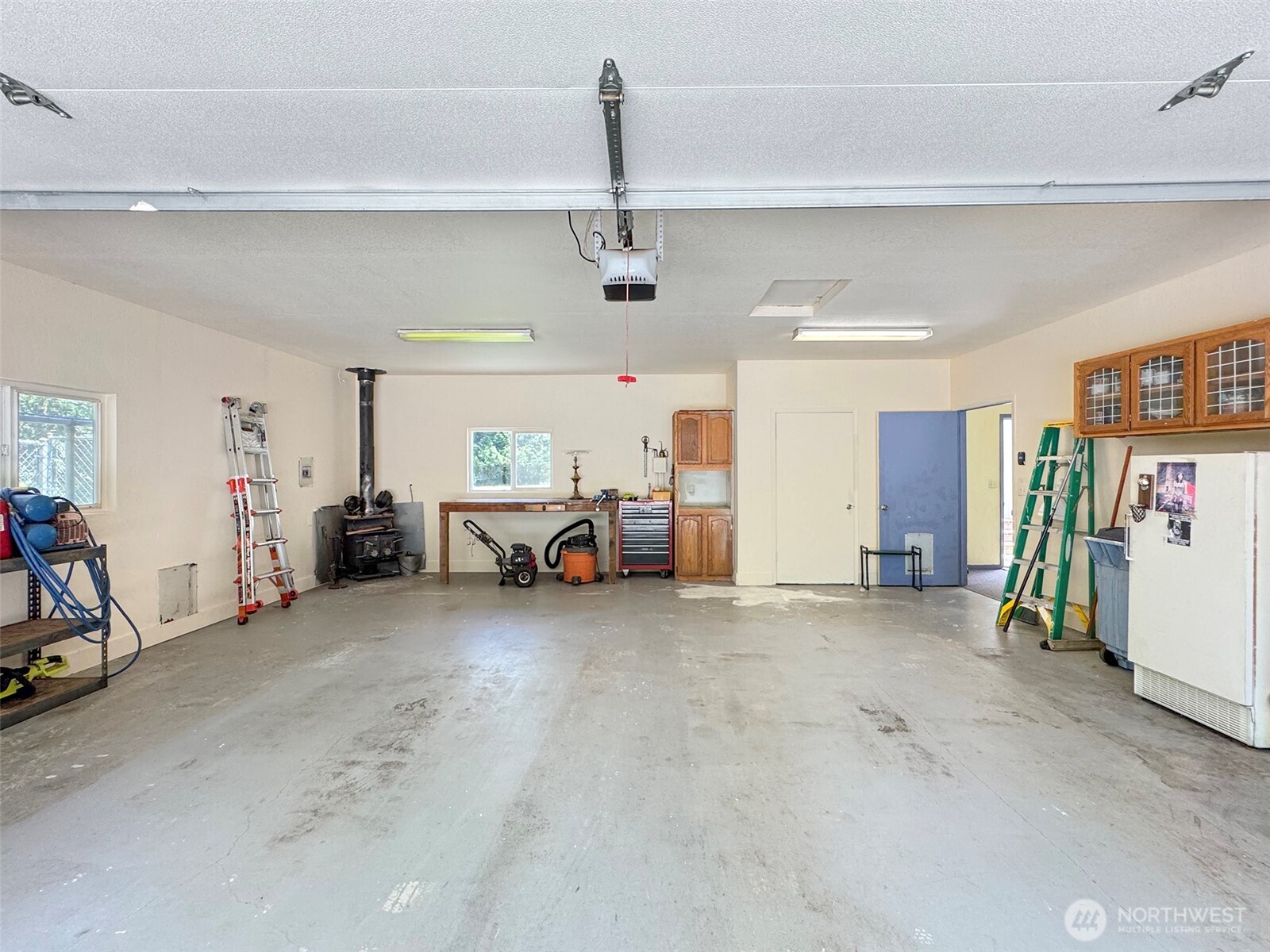 77 Rd Less Traveled Way Sequim, WA 98382 - Photo 33 of 40 a view of a livingroom with furniture and a ceiling fan
