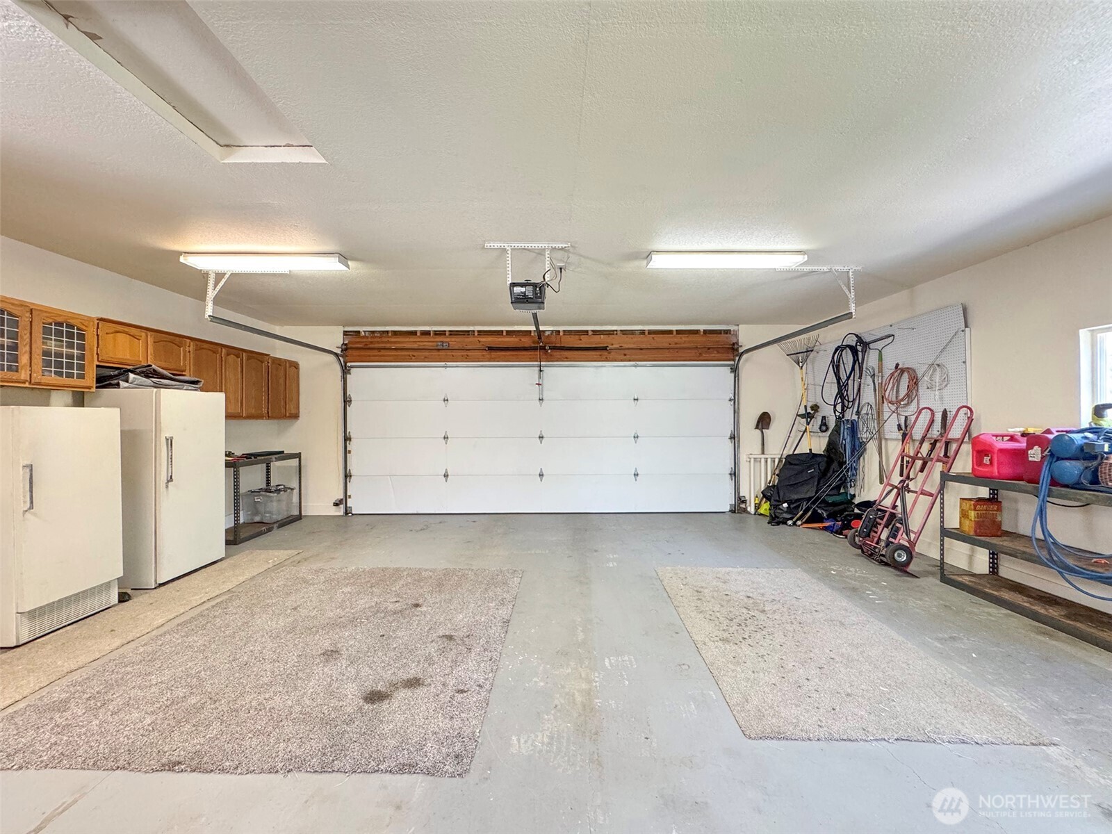 77 Rd Less Traveled Way Sequim, WA 98382 - Photo 34 of 40 a view of a garage